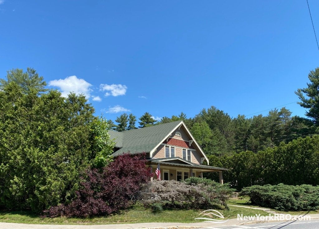 The Best Adirondack Vacation Rentals for Large Families and Groups of 10 or More! 10 690 - Historic craftsman home with lake views - WALK TO TOWN AND BEACH!